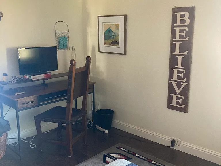 Den with dedicated desk space