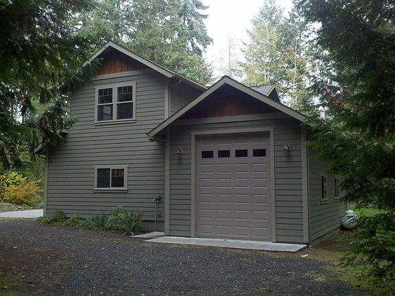 A 3rd garage bay with extra height for a boat, RV or extra v