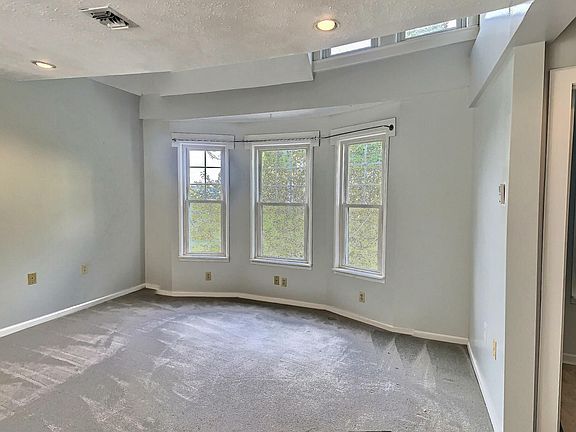 Living room with bay window.