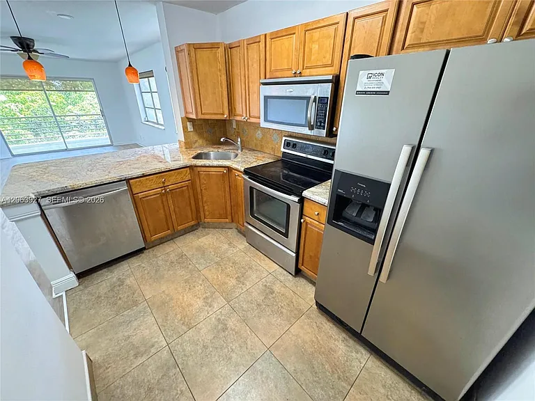 1400 NE 57th St #308 — Photo 1