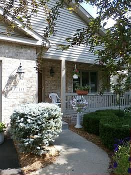 Do you enjoy sitting out side on a beautiful summer morning?  Welcome to the front porch and please come in....