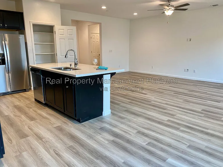 6696 E Vassar Ave — Photo 3