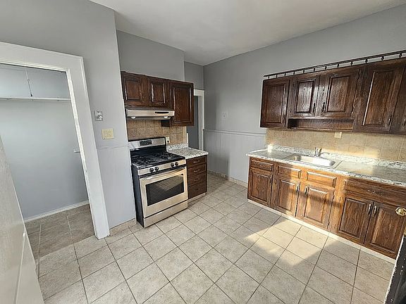 Kitchen with pantry.