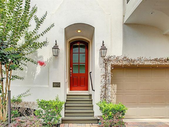 Gorgeous Stucco Front with lots of charm in gated community.