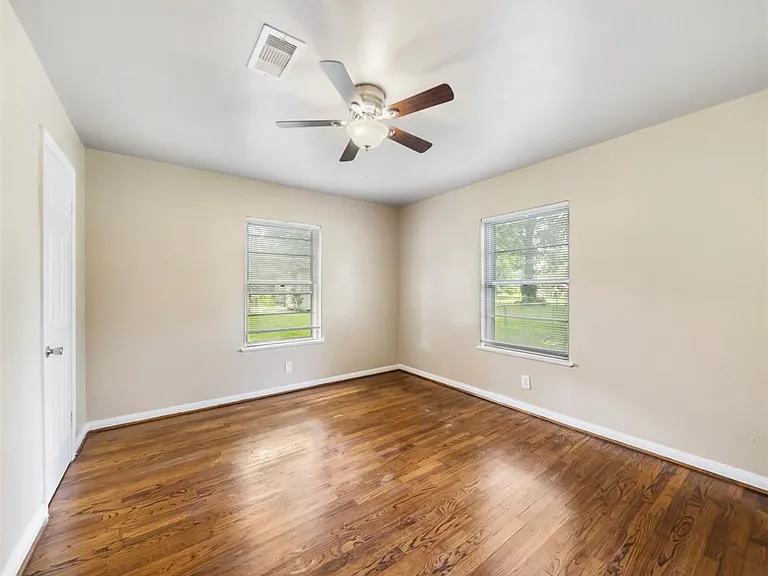 Three nice-sized bedrooms with hardwood floors.