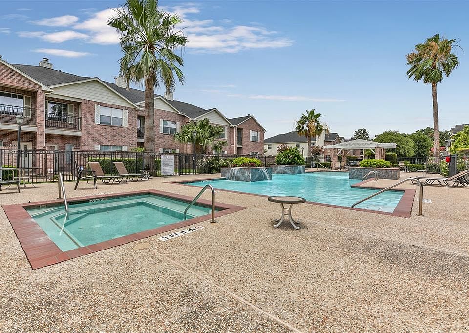 Unit #34 is just steps away from this beautiful pool area.