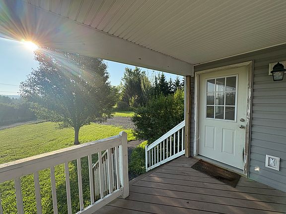Seperate entrance from porch (2nd separate entrance from garage, no entrances shared with other apartment)