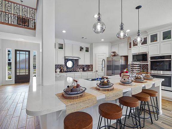 Kitchen with island and pendant lighting