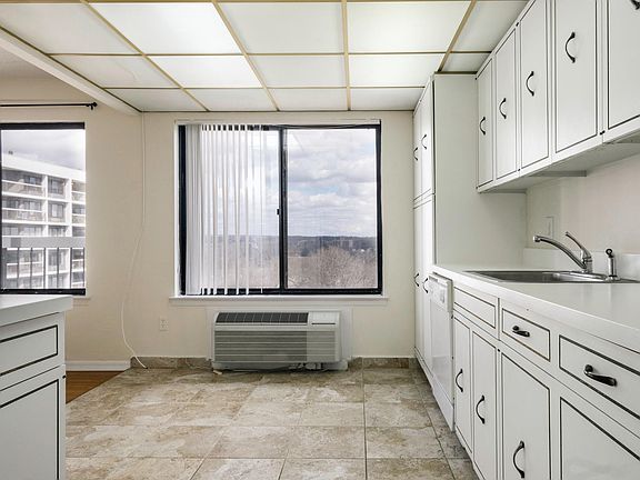 Kitchen Partially open with Window in Kitchen