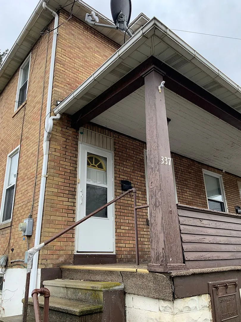 2 Bed | 1 Bath Duplex — Photo 1