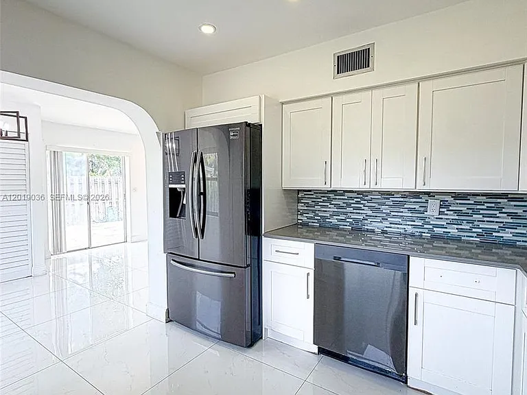 240 NW 36th St — Photo 3