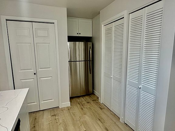 Pantry and extra storage above refrigerator. Brand new appliance