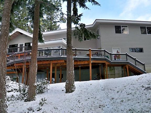 The ocean side of the house with the expansive deck