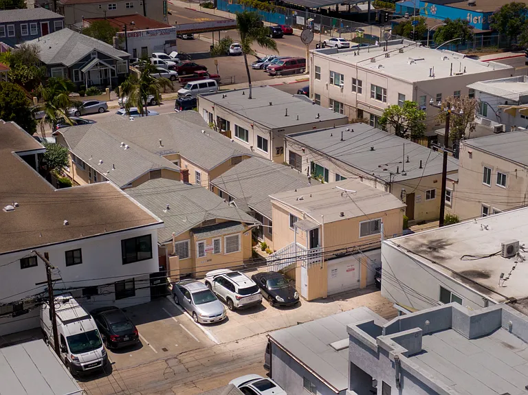 Aerial view of 3843-3849 First Ave parking area at back of property in alley
