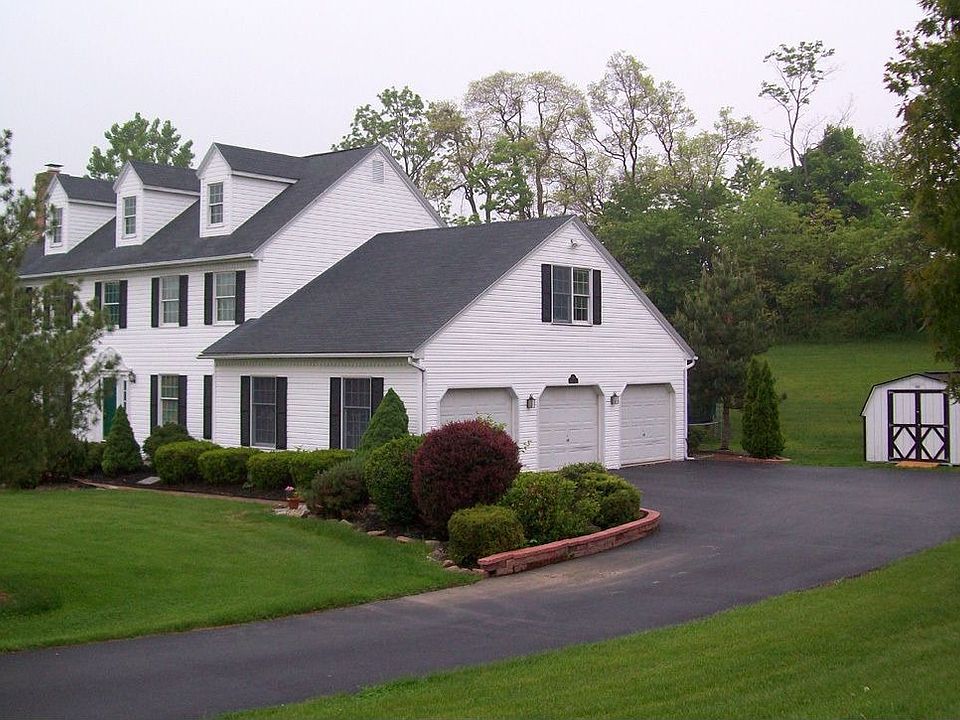 3-Story colonial with 3-car garage & shed, 