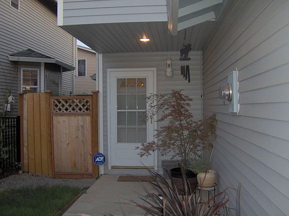 Walkway to front door; gated back 