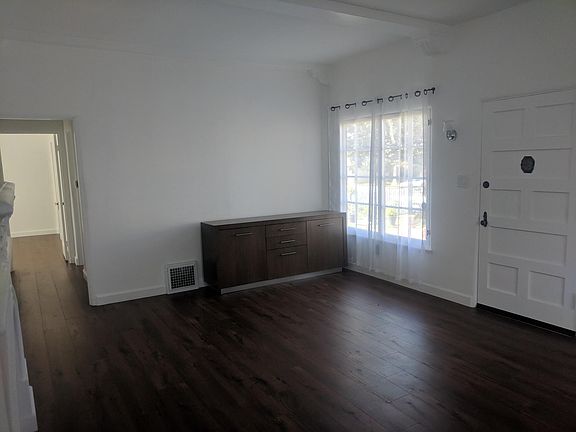 Living room, from hallway to kitchen (Note that furniture ca