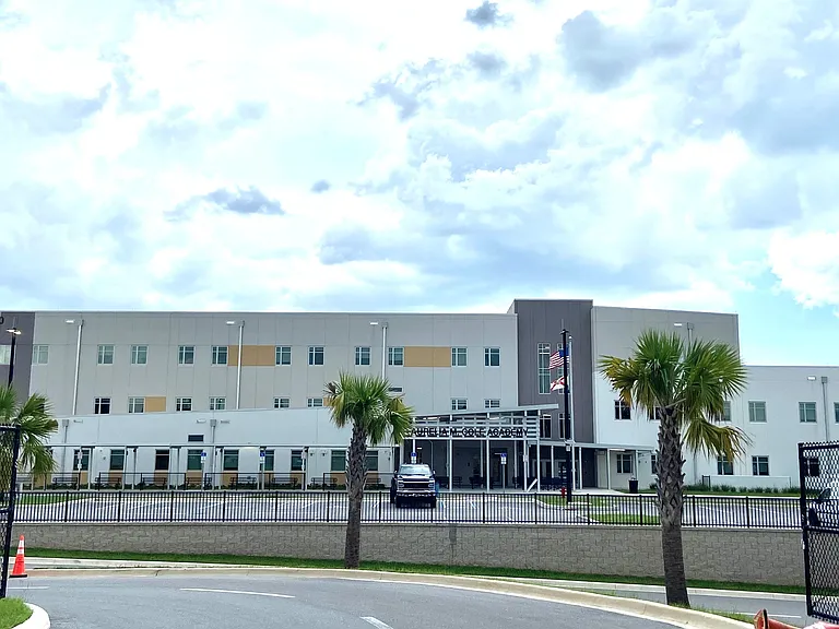 This home is right behind the new school Aurelia M Cole K-8 school