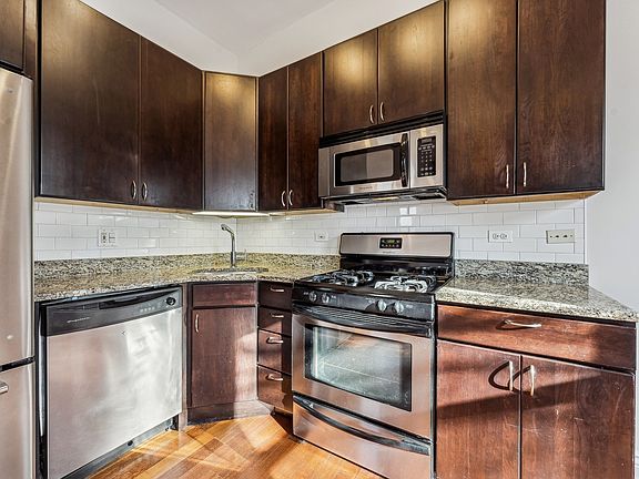 4th image of 1956 W Bradley Pl APT 2E