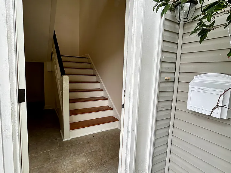 entrance. storage room under the stairs