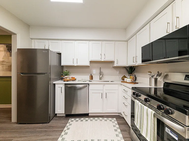 Kitchen with granite counters and stainless appliances