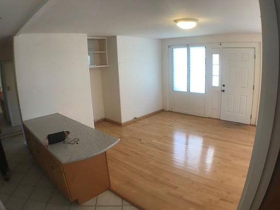 spacious family room, with unit front door