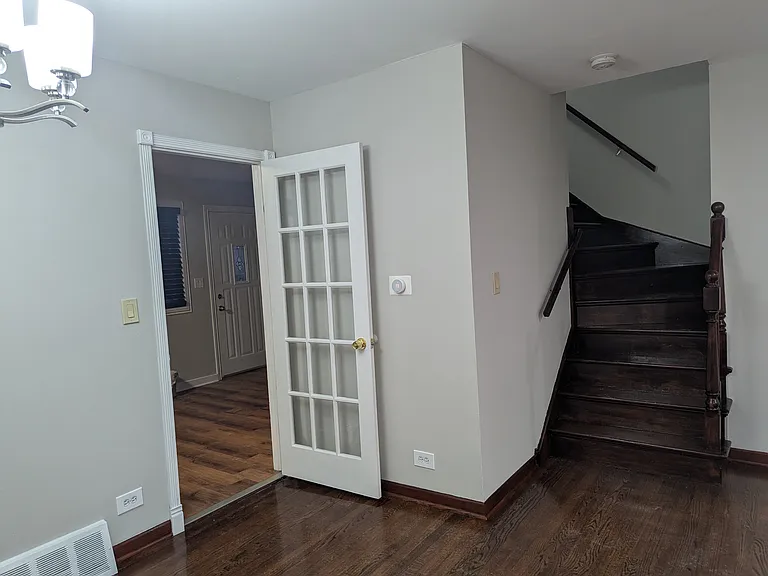 Dining room, stairs to bedrooms upstairs and door to left is kitchen