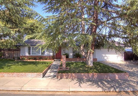 Two Car Garage with Finished Walls, Extra Storage Cabinets, &amp; Pull Down Attic Storage