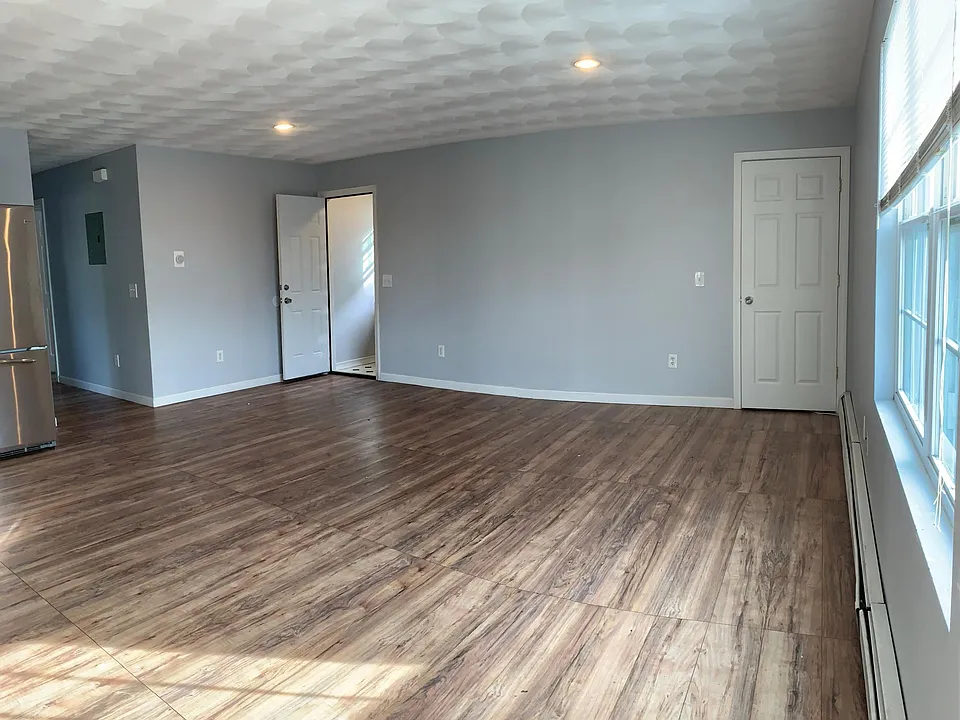 Living Room area, open space ALL UTILITIES INCLUDED | 3BR | Private Patio | 2-Car Parking | Central A/C