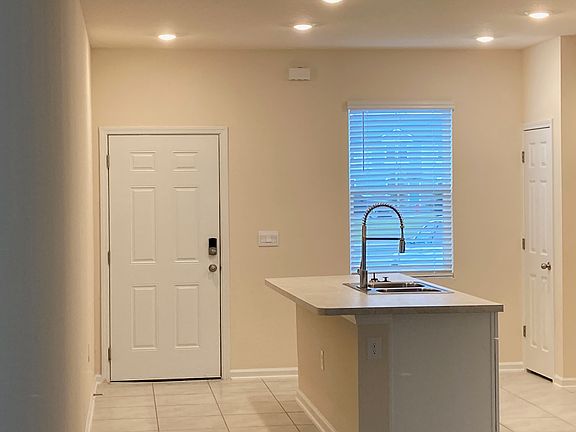 Front Door/Kitchen