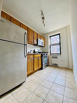 2nd image of 66-15 Wetherole St #3F