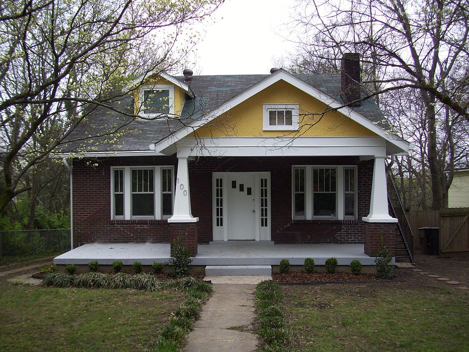 Front view of the house with front porch.
