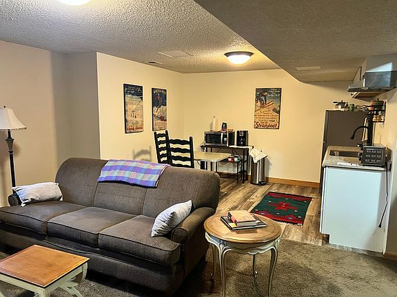 Large area is living, dining and kitchen
