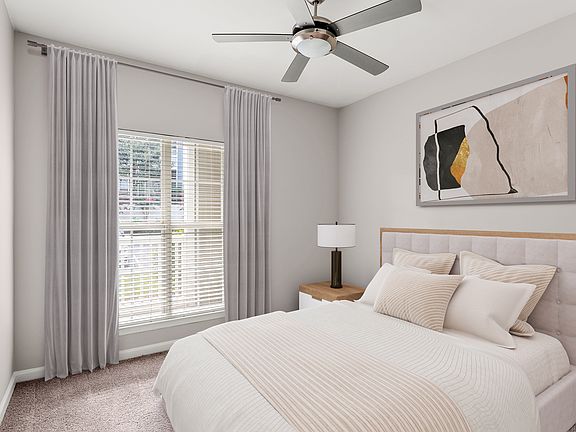 Retreat to a bedroom built for relaxation.