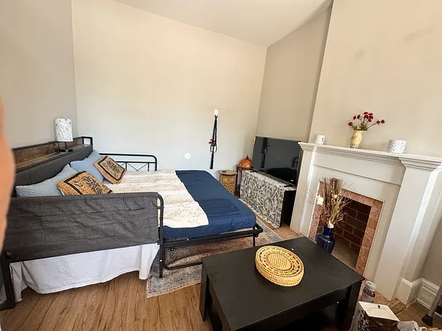 The coffee table set aside to make it a king size bed when the two twin beds are set side by side. Enjoy watching tv or read a book.