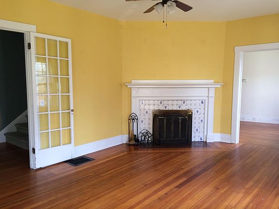 Living room: wood-burning fireplace