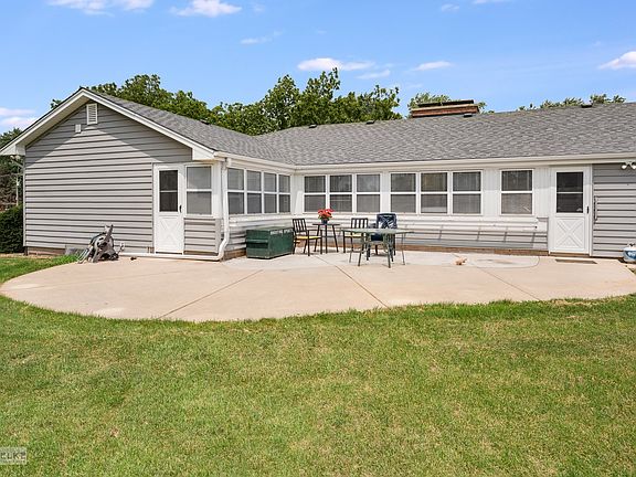 Nice large patio and enclosed sunroom