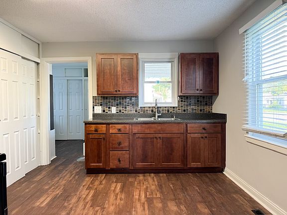 The kitchen conveniently flows right into the mudroom / laundry area.