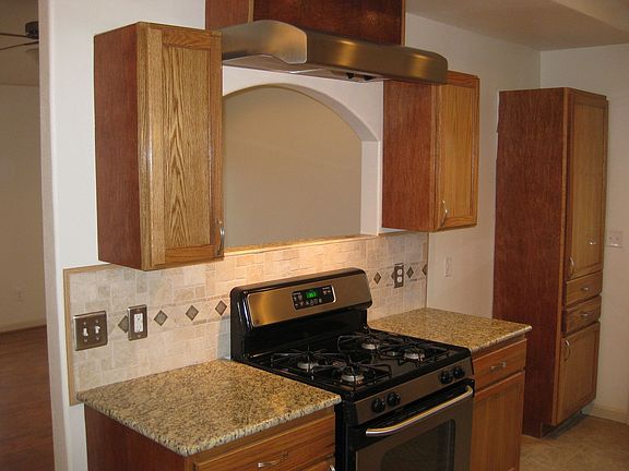 Kitchen Archway and Granite Countertops