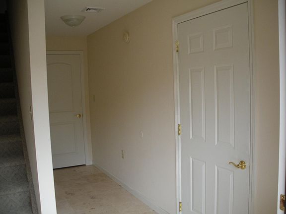 Foyer (garage door-basement door-stairs)