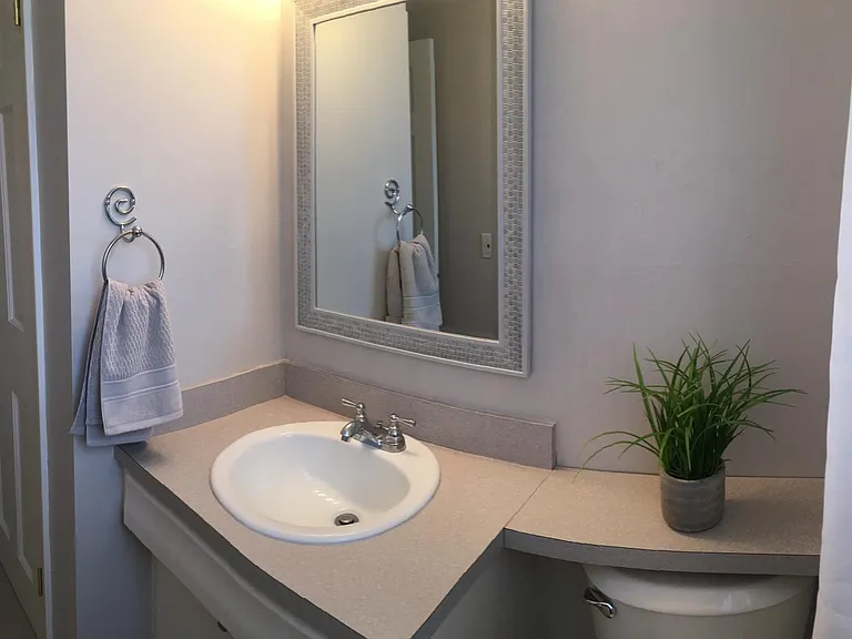 Powder room off of kitchen.