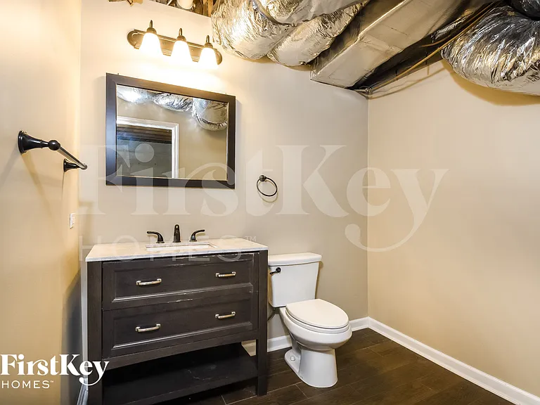 1064 Whispering Woods Dr — Photo 10