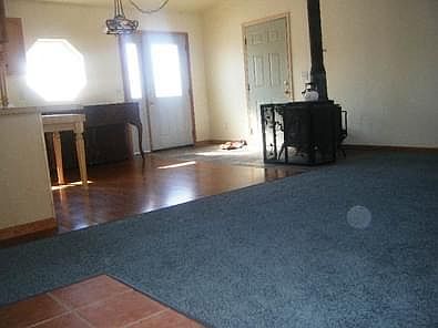 Woodstove not present anymore. Replaced with natural gas.