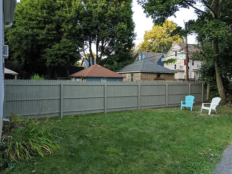 Shared backyard with plenty of space for a barbeque.