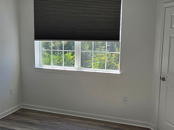 bedroom with new blackout shade.