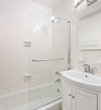 4th image of 115 E 9th St APT 3B
