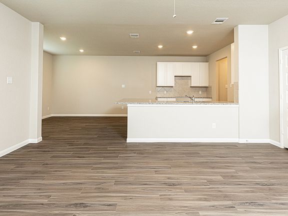 Family Room to Kitchen and Dining Room