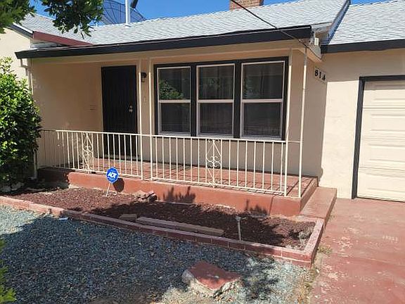 another view of the front of the house with insulated garage