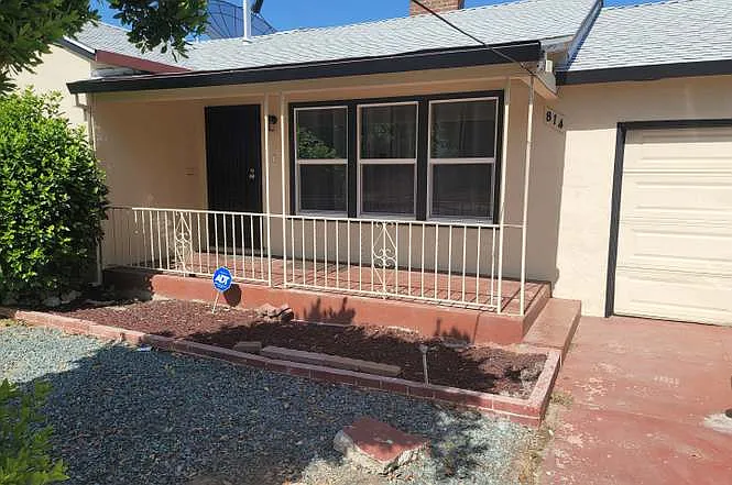 another view of the front of the house with insulated garage