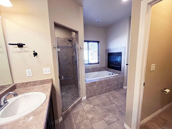 main floor large bathroom with walk-in closet
